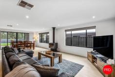  7 Pippin Court Harcourt VIC 3453 $895,000 - $925,000 Be immediately impressed by the curbside presence, then prepare to fall in love with the exceptional interiors of this stylish family home that presents in as-new condition. Offering a layout tailored to liveability & function along with finishes that will appeal to the fussiest buyers, the home spans one accessible single level and is wrapped in smartly landscaped gardens. With multiple living zones offered, the main open plan area is extravagantly proportioned and warmed by an inviting wood-box burner. Entertainers will love this space that connects effortlessly with the gourmet kitchen boasting quality appliances, split dishwasher, masses of storage & preparation space along with a large walk-in pantry. Outside, an undercover alfresco patio looks out to the garden where there is ample space for the kids to play. Adjacent a peaceful sitting room, the spacious master boasts an ensuite and walk-in robes, while the three additional bedrooms are all zoned away together with a rumpus/TV room and the main bathroom to create an ideal kids' wing. A laundry with garden access, wardrobes in all bedrooms and storage all along the hall are also offered, together with striking tiled accents in the wet areas and cool matte black tapware. Evaporative cooling and a 5KW solar array with battery are added highlights of a package that is finalised by a double garage with internal entry and side access. The double garage is a generous 5.5x6 and opens directly into the home. Handy people or outdoor types will also appreciate the 10x8 rear shed with concrete floor, power and lighting it also boasts over height doors for the boat and caravan together with access from the front and rear of the property. The yard is securely fenced for the safety of both children and pets. Located in a quiet estate merely 600m from the centre of Harcourt and an approximately 30-minute drive from Bendigo. 