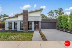  7 Pippin Court Harcourt VIC 3453 $895,000 - $925,000 Be immediately impressed by the curbside presence, then prepare to fall in love with the exceptional interiors of this stylish family home that presents in as-new condition. Offering a layout tailored to liveability & function along with finishes that will appeal to the fussiest buyers, the home spans one accessible single level and is wrapped in smartly landscaped gardens. With multiple living zones offered, the main open plan area is extravagantly proportioned and warmed by an inviting wood-box burner. Entertainers will love this space that connects effortlessly with the gourmet kitchen boasting quality appliances, split dishwasher, masses of storage & preparation space along with a large walk-in pantry. Outside, an undercover alfresco patio looks out to the garden where there is ample space for the kids to play. Adjacent a peaceful sitting room, the spacious master boasts an ensuite and walk-in robes, while the three additional bedrooms are all zoned away together with a rumpus/TV room and the main bathroom to create an ideal kids' wing. A laundry with garden access, wardrobes in all bedrooms and storage all along the hall are also offered, together with striking tiled accents in the wet areas and cool matte black tapware. Evaporative cooling and a 5KW solar array with battery are added highlights of a package that is finalised by a double garage with internal entry and side access. The double garage is a generous 5.5x6 and opens directly into the home. Handy people or outdoor types will also appreciate the 10x8 rear shed with concrete floor, power and lighting it also boasts over height doors for the boat and caravan together with access from the front and rear of the property. The yard is securely fenced for the safety of both children and pets. Located in a quiet estate merely 600m from the centre of Harcourt and an approximately 30-minute drive from Bendigo. 