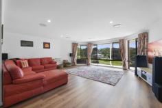  30 Cornwall Drive Elanora QLD 4221 This spacious family home is set in an elevated position on 1.46 acres of pristine land, just 10 minutes from the golden sands of Currumbin Beach. If acreage near to the ocean is your idea of the perfect lifestyle, this home could be a dream come true. As you rise, you'll love enjoying your morning coffee from the elevated position of your bay windows overlooking the gently sloping front lawn dotted with kangaroos and wallabies, before letting your gaze rise to enjoy the treeline of surrounding bush areas. When the kids arrive home in the afternoon you'll welcome the layout of this home, with the kitchen overlooking a sparkling mineral pool, vast undercover alfresco area and fully fenced house block with separate area beyond for chickens or other hobby farm desires. The blend of modern and traditional on this property provides the most versatile lifestyle opportunities. The home is largely powered by solar and has smart home capabilities like zoned temperature control, an integrated sound system, and lightning fast NBN. However, when you're ready to unplug there is ample space and infrastructure to sink your hands into the earth of a thriving vegetable garden, tend to your animals, enjoy the massage jets of the pool, or simply curl up by the wood burning fire place for cozy winter evenings. The improvements that are less glamorous but essential to create a high standard of living have been completed by current owners who are driven by quality and attention to detail. This includes things like installing outstanding storm water drainage, roof renovations, repositioning power poles to outside the fence line, installing quality full coverage fencing, a state of the art waste water management system and so much more. The result is a home of outstanding quality ready for you to move in as is, make aesthetic updates, or even bring your own renovation to life with a quality foundation to work from. The main family home features an updated kitchen with stone bench tops and an induction cooktop, four spacious bedrooms, two bathrooms, and two light-filled living areas each with a beautiful outlook. An additional one bedroom unit with bathroom and kitchenette is separated from the main home by an enclosed breezeway. This space is ideal for dual-living, a private home office, wellness space, or teenage retreat. The opportunities are endless in a property of this calibre set on stunning acreage in a central location between the beach and the Hinterland, with all the amenities of city life accessible in just a few minutes drive. FEATURES - MAIN HOUSE Set in an elevated position with a beautiful outlook Four bedrooms, three bathrooms, two living areas one with wood burning fireplace Huge undercover alfresco area with doors opening onto the kitchen/dining area and master suite Over-sized master retreat with walk in wardrobe, ensuite with double vanity, and separate spa room Three other good sized bedrooms all with built-ins Main bathroom with separate toilet Hybrid floating flooring to living areas, slate tiles to kitchen and hallway Zoned, ducted reverse cycle temperature control with temperature sensors managed by central tablet or your smart phone Wired for Dolby Atmos surround sound system with ceiling speakers Internal laundry with linen cupboards 2 x Solarhart systems providing solar power and hot water Separate double garage with additional carport FEATURES - LAND 5905m2 fully fenced rectangular block suitable for families who love pets like dogs, horses, chickens and more Town water plus 5000L rainwater tank Mineral or salt pool with multi-option spa jets Taylex tank with Envirocycle water treatment system servicing all three bathrooms Stormwater drainage to street gutter system FEATURES - 1 BEDROOM UNIT Separated from main home by an enclosed breezeway Has its own separate access One bedroom with compact ensuite and views over front lawn to nearby treeline Kitchenette with cupboard space and sink adjoins dining/living area overlooking pool and alfresco area Plumbed in for washing machine LOCATION Elanora High School - approx 8 minutes Elanora State School - approx 9 minutes The Pines Shopping Centre - approx 9 mins Currumbin Beach - approx 10 mins Gold Coast International Airport - approx 17 mins Burleigh Heads - approx 18 mins 