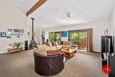  12 Jensen Close Coffs Harbour NSW 2450 $950,000 - $1,000,000 Beautifully maintained and immaculately presented, this breathtaking five-bedroom resort style home promises something for the whole family. With north-facing living areas and set on a rare 876 sqm block in a sought after cul-de-sac, the grand-scale two level home is located approximately 10 minutes drive to the beautiful Coffs Creek, boardwalks, shops, cafes, and fantastic golf course. Boasting soaring ceilings, the kitchen and dining area is flooded with natural light and opens to a large wrap around entertaining deck, a surrounding tropical pool and a fully fenced grassed garden area, giving ample opportunity to host guests or just relax with the family. The lower level of the home has a smart and generous floorplan with two bedrooms, bathroom and separate powder room. This makes it great for guests or long-term family visitors, teenagers or parents living with you. Also, on the ground floor you have an oversized double lock-up garage with workbench plus additional storage spaces. Upstairs is a king-sized master bedroom or parents retreat with a large northeast facing covered balcony to enjoy the winter sun plus oversized walk-in robe. Two more generous sized bedrooms, study, a multi-purpose/family room with fireplace and balcony, family bathroom and separate powder room are also on the upper floor. Manicured landscaping and tropical gardens frame this sprawling home which holds a prime position at the end of the cul-de-sac. Flooded with light and offering lifestyle and entertaining zones at every turn - a peaceful retreat or a place for multi-generational activity. Summary of features; - Luxurious five-bedroom home in fantastic location - Generous kitchen with oversized stone benchtops and breakfast bar - Open plan living with soaring ceilings - Covered north facing entertaining deck - Master bedroom retreat with oversized wardrobe and covered balcony - large study with room for two work stations plus storage - Family or multi-purpose room with fire place and balcony - Ground floor with two guest bedrooms, bathroom and powder room - Upper floor guest bedroom with ensuite and balcony - Fully fenced garden with flat grass for pets and kids - Resort style swimming pool - Ducted air conditioning, fans in all rooms - Large solar system - Oversized double lock up garage, work bench storage - Five mins drive to Park Beach Plaza, 10 mins to a multitude of beautiful beaches. - Rear access to the yard with large double gate. 