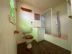  9 Dougall Street Bororen QLD 4678 This property is set in the hub of Bororen set on a 1012m2 block of land which is fully fenced. The property does front the Bruce Hwy only approx 30mins to Tannum Sands and Boyne Island . Walk to Bororen primary school and school bus pick up to either Tannum Sands or Miriam Vale HIgh school. * Simple cottage style home with front timber deck * Fully fenced yard surrounded with well established trees * Two bay zincalume shed with a workshop area * Functional kitchen with stainless steel oven * Separate lounge room with ceiling fan * Separate dining room * Main bedroom with walk in wardrobe and ceiling fan * Second carpeted bedroom * Bathroom with shower over bath and toilet * 9' high ceilings * Currently tenanted. Weather you are looking to live in your self or wanting an investment for the future. 
