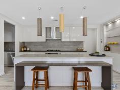  6 Grocke Way Tanunda SA 5352 $799,000 Welcome to 6 Grocke Way, Tanunda. Built in 2015 this former flagship Sterling show home, which has never been lived in, is set back on an expansive 692sqm. Situated in the renowned Sovereign Estate, the home is within walking distance to schools, parks and Tanunda’s Main Street. Comprising of 4 king sized rooms, 2 bathrooms, 4 living areas, double garage and manicured gardens, this home is full of extras and luxury additions many astute buyers are looking for. The home features: •Master bedrooms with walk-in-robe equipped with shelving and storage space, a large ensuite with floor to ceiling tiles includes a double vanity and a featurette walk-through waterfall shower. •The spacious front living room is appointed with sheer curtains and timber window trims outlooking the fabulous front gardens. •The main living area focusses on a walk through kitchen with stainless steel appliances, pendant lighting, featurette benches and a butlers pantry with direct access into the double garage. •Looking out over the kitchen is the meals and living area surrounded by large windows allowing an abundance of natural light to flood the room •Down the hall, the three king sized rooms with built-in robes all surround the three-way main bathroom with floor to ceiling tiling and convenience of a separate toilet •Another separate living space is perfect for a home office, children’s area or further living space •Outside, well appointed, private and established gardens are perfect to relax or watch the family grow Other features include •Reverse cycle zoned air-conditions •Security system •Irrigated gardens •Stone bench tops •Much much more! 