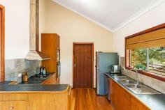  14 Railway Crescent Stanwell Park NSW 2508 $2,250,000 Boasting plenty of space for the whole family, a peaceful setting and only a short walk to the local cafes, school, parklands and the pristine Stanwell Park Beach. This attractive property offers you the idyllic Stanwell Park lifestyle that you've always dreamed of. HOME: * This spacious and versatile home ticks all of the boxes and is perfect for families of all sizes. * An open plan living, dining and kitchen with vaulted ceilings is the centerpiece of this impressive residence and will undoubtedly be the setting for many happy memories with your family. * The lower level of the home features a separate entry with living area, kitchenette, bathroom and bedroom, making it the ideal space for use as an airbnb, teenage retreat or accommodation for elderly parents. * Beyond the lounge room is entertaining deck which overlooks the backyard and mature native trees. This is the perfect setting to enjoy a BBQ with friends or alfresco meals with the family while taking in the picturesque backdrop. * A flat, fenced and private backyard creates a safe space for children and pets alike to play. * Featuring a spacious double garage and additional storage for your boards, bikes and all of those other 'must-have' accessories that come with the coastal lifestyle. LOCATION: * Positioned on a private driveway shared with several neighbours. This is a popular, private and safe community. * Direct access from the rear to Lawrence Hargrave Drive means it is only minutes stroll to the pristine Stanwell Park beach which is fully patrolled, offers fantastic surf breaks and is dog friendly. * You can leave the car at home as the local cafes, school, shops and restaurants are all only steps from your front door. * The Royal National Park is situated just beyond the top of the hill 10 minutes drive. * Stanwell Park is situated approximately 1 hour South of Sydney CBD and approximately 30 minutes North of Wollongong CBD. * Embrace the quintessential coastal lifestyle and all that comes with it... swimming, fishing, bushwalking, hang gliding and family picnics in popular parklands all available only moments from your doorstep. 