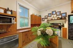  17-19 Panorama Rd Bundanoon NSW 2578 $1,950,000 - $2,145,000 Historic circa 1900s sandstone cottage set amongst a stunning Edna Walling designed garden offering old world charm and scope for so much more. Enter via the privately screened gate over the engineered bridge and through the gorgeous grounds before finding yourself at the cosy two bedroom residence, the ultimate weekend hideaway, holiday rental or forever home. Cottage is mostly in original condition offering two bedrooms and a generous well proportioned bathroom and separate laundry / mudroom, a very usable space; Open plan living / dining flows to both the front stone terrace with centrally placed water feature and the side screened verandah perfect for hot summer nights, and flows seamlessly to the large kitchen with Aga, in need of some renovation plus additional access to the rear verandah; Heating is via the s/c wood fire with modern conveniences blending with charming finishes such as all town services, timber casement windows, French doors, high ceilings and constructed from Bundanoon Sandstone, all adding to the uniqueness of this cottage; With subdivision potential a real possibility (STCA) and / or space at the rear of the property for a second dwelling if desired, this elevated sweeping lawn area offers distant local views and privacy from the original residence; Breathtaking gardens wrap this home in privacy with dappled sunlight warming the home and verandahs. Offering a series of garden rooms, inclusive of European and Australian species, rainforest oasis and heritage orchard, a great place for children and adults alike to explore. Minutes to the village and all Bundanoon has to offer, in a blue ribbon street ‘Estoril’ will capture your heart. 