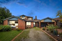  4 Devereaux Court Frankston VIC 3199 $860,000 - $946,000 Superbly sized for growing families with two spacious storeys and a resort-style ambience converging around the lagoon-shaped swimming pool and spa, this appealing five bedroom home offers an exciting upsizing opportunity for growing families in the lovely Lakewood Estate. Clinker brick and wonderfully designed with a well-considered flow, householders will relish the choice of three sizeable living areas to spread out and entertain friends, while the timeless kitchen pairs woodgrain cabinetry and granite countertops with a stainless-steel oven, gas cooktop and gunmetal grey dishwasher. Set on a spacious 644m2 (approx) allotment, the residence has been oriented to capture generous natural light and allow ample room in the north-facing backyard for the inground swimming pool and circular spa flanked by brick paving, with an undercover alfresco area with bistro blinds providing an all-season space for outdoor living and barbecuing. Adaptable for growing needs, in-laws or guests, the residence offers two bedrooms on the entry level serviced by an ensuite and family bathroom, while the upper level with retreat hosts two more bedrooms and a full third bathroom with elevated spa bath. Footsteps to Kingsley Park Primary School and the Shaxton Circuit cafe strip and around 15 minutes' walk to Mt Erin College within a tranquil enclave between the golf course and Robinsons Park, the property includes balconies on both levels, a gas fireplace, ducted heating, evaporative cooling, a carport, garage and additional off-street parking. 