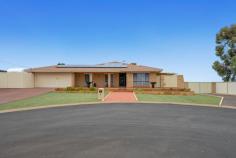  7 Geere Court HANNANS WA 6430 $719,000 With tree tops views of our beautiful outback this family home is just amazing. Check out how this property has 5 different entertaining/space areas. 4 bedrooms – all with BIR’s 2 bathrooms Ensuite with corner spa bath Theatre room with full theatre experience curtains Enclosed double book case Full surrounding security system Stunning modern kitchen with tree top views Dishwasher Double pantry Ample cupboard space Island bench with breakfast bar Sparkling below ground pool 1 x powered shed with access 1 x powered workshop 1 x powered storage shed Easy care established yard and gardens Double enclosed carport with electric roller shutter Established fruit trees Extra parking for caravan etc behind the main gates All gates are pool secure Roller shutters to the front of the home Here is a brief run down on the 5 entertaining/space areas (1) Coming straight out from the kitchen is a fully enclose amazing gable pitched entertaining are with outdoor lifestyle blinds overlooking the pool. (2) To the side of the house is a huge entertaining patio that looks directly over the beautiful bushlands. (3) To the other side of the house there is another massive gabled pitched entertaining area surrounded by easy care established gardens. (4) Around the pool is a raised area perfect to sit beside the pool with sun shade. (5) The entry to the pool has a cute viewing area overlooking the pool from behind the gates. 