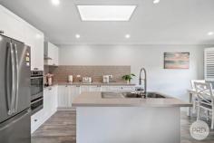  2/8 Charthouse Avenue Corlette NSW 2315 $730,000 - $780,000 Delivering the coastal lifestyle, this light filled Torrens title duplex has been beautifully renovated throughout, with nothing to do but unpack your bags. On entrance level you will find the open plan living flowing directly off the gourmet kitchen, two spacious bedrooms both with built-ins, main bathroom and internal access to the garage. On the lower level is the mater bedroom with huge ensuite, second living space that opens onto the low maintenance manicured yard. Relax and take in the leafy view from the upstairs balcony where you can enjoy a morning coffee or afternoon refreshment. This is one opportunity that you do not want to miss out on. 
