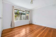  20 Havana Crescent Frankston VIC 3199 $550,000 - $605,000 Embraced by the sweet scent of mature roses this three bedroom residence offers an enticing blend of original charm and updated finishes to ensure character and comfort. Positioned only moments from Karingal Heights Primary School and less than 10mins (approx.) from PARC, this home's position within the greater Frankston landscape offers all that could be desired from recreational and retail to medical amenities. Revealing the details of original 70's textured glass, the living domain occupies a street-facing position where corner windows welcome natural light and the year-round comfort of split-system air conditioning. Central to the layout is an original kitchen complete with chocolate brown cabinetry and an upright cooker with a gas stove with an adjoining meals space. Continuing throughout the accommodation zone, polished timber flooring and retro light bring the three bedrooms together with a sense of rest, each welcoming natural light before the main bed completes with a built-in robe. Drive-through access from the carport reaches a level rear yard providing ample space to nurture a landscape to maturity or extend the existing dwelling for enhanced internal proportions (STCA.). 