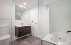  1/83 Athleen Avenue Lenah Valley Tas 7008 $795,000 Set in the superior suburb of Lenah Valley, this near new, architecturally designed, executive townhouse featuring designer glass aggregate blockwork will define a new standard in high-end property in Hobart. Townhouse 1 offers an extremely versatile floorplan catering for executive couples, small families, investors and retirees. The home comes complete with well planted native gardens, a stunning balcony for luxurious entertaining, panoramic views, double garage, extensive double glazing throughout, full insulation including under the ground floor concrete slab and small courtyard. Cleverly positioned to capture great sun, warmth and an amazing outlook the property showcases an impressive combination of intelligent design with quality modern finishes. From the entry foyer on ground level you have either internal access to the double garage or access to two good sized bedrooms featuring built in wardrobes and a unique family bathroom. The staircase upstairs leads directly to the social heart of the home, the spacious open plan and versatile living areas and kitchen. It is complimented by its sleek design and extremely contemporary appearances. The striking kitchen with premium acrylic solid surface bench tops, soft close drawers, push cupboards, offers Franke appliances including integrated dishwasher, induction cooktop and undershelf 700mm rangehood. This area of the home with sliding doors to the undercover terrace provides a modern and practical space for the entire family. Completing the homes accommodation is the master bedroom providing a full dressing room and dual access into the upstairs bathroom and powder room doubling as an ensuite. The bathroom here features programmable under tile heating, twin head showers and on trend swiss designed black fittings. Having been built with efficiency in mind, the townhouse was designed to minimise occupant maintenance with all year round green artificial grass in the courtyards, covered tiled terrace and well planted native gardens surrounding the home. The layout and window positioning ensures the fortunate purchaser will feel as though privacy is paramount. These breathtaking townhouses will epitomize luxury. You are purchasing a lifestyle of low-maintenance living. Located 5 minutes from the CBD and Salamanca, close to all schools, shops, cafes and restaurants of Lenah Valley connect to the convenience today. The quality is unsurpassed and the superiority can only be understood with a private tour of this home. If you are searching for a value for money property close to Hobart then you need to explore 83 Athleen Avenue, there is nothing comparable in greater Hobart. It provides a quality offering of timeless ambience and stylish living. You will not be disappointed, this is where all of your dreams come true. 