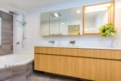  44 Tain St Applecross WA 6153 Ideally positioned on a 469 square metre corner Survey Strata lot, this single level charmer has undertaken a complete transformation inside and out so is not to be missed! Upon entering through the welcoming double doors, the natural light and space of this home are immediately apparent. Internally, no stone has been left unturned in this renovation with new flooring throughout, brand new kitchen and new ensuite bathroom, new blinds and curtains throughout, new door hardware and LED lighting. There is also an inviting gas log fire for heating an ambience to the main living area. This home has a sensible floor plan with an open layout and multiple living areas. The open plan kitchen, meals and living area forms the heart of the home and extends directly onto the outdoor alfresco area which is ideal for entertaining! The newly renovated kitchen has been tastefully remodelled with neutral colours, stone bench tops with wide waterfall edges, ample drawers and overhead cabinetry, Bosch appliances as well as space for a double door refrigerator with rear plumbing. The large kitchen windows offer a direct view to the external alfresco area so that even when in the kitchen, you can still be amongst the entertainment! The stunning alfresco has undergone a complete transformation with new patio, paving and landscaping with reticulation making it feel like your very own tropical oasis! This area extends through to the front grassed area which is fully fenced, providing safe and secure space for children and pets to play. Externally the home has also been rendered and painted and has undergone a full roof restoration. The master bedroom is a generous size and has external access to the front courtyard via a sliding door. A new, spacious walk-in robe has been created in the master bedroom while the ensuite bathroom has been fully renovated with full height tiling, floating vanity with ample storage and a bath and shower. Other features of this desirable home include a bore system, 6kw solar panels with 5W inverter, new heat pump storage hot water system, camera security system, new air-conditioning system and data cabling to every room in the house with central hub. There is also a new double garage with store room and storage loft with an attractive flat panel garage door. Stroll to the riverfront foreshore, cafes, shops, transport, parks, Applecross Primary School, Ardross Street café strip and transport options. 