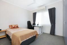  4/35 Coronation Drive Stuart Park NT 0820 $430,000 Delivering on location, this effortless ground floor unit is beautifully situated within the sought-after suburb of Stuart Park, just a few minutes' drive from the CBD. Recently renovated, the unit feels light, bright and wonderfully low maintenance. Highlights within include flow-through living opening out to a private courtyard, a stylish kitchen, two generous bedrooms and an attractively appointed bathroom, with undercover parking at the side. Recently renovated ground floor unit set within leafy surrounds Carefully considered layout flaunts separate living and dining within flow-through space Modern kitchen with stainless steel appliances and induction cooktop Picturesque patio framed by fencing for peace and privacy Two generously sized bedrooms, each with built-in robe Central bathroom in contemporary style, features dual-head shower and double vanity Integrated laundry in bathroom Single covered carport with adjoining undercover & lock-up storage Close to local shops & dining, moments from CBD Combining style with convenience, this light-filled unit offers low maintenance living within easy distance of the CBD, set within the sought-after suburb of Stuart Park. Situated within lush green surrounds, the unit is part of a boutique complex set back off a quiet tree-lined street, just a short stroll from local shops, dining and Stuart Park Primary School. Ready to move right in or rent out, the entire unit has been recently renovated to reveal a fresh, bright interior, accentuated by neutral décor and attractive hybrid floors. Stepping into the spacious dining room, you are greeted by a gorgeous kitchen, flaunting subway tile backsplash, breakfast bar dining and stylish pendant lighting. Moving through to the lounge room at the back, you are drawn out to a peaceful patio, which effortlessly extends the living space, with plenty of room for relaxing and dining. Back within the fully air-conditioned interior, two carpeted bedrooms make up the sleep space, centred around a sleek bathroom complete with frameless glass shower with dual showerhead, a large dual vanity and an integrated laundry. Accessed via an internal door, the adjoining single carport delivers further appeal with lock-up storage and an undercover space, perfect for storing bikes and other large items. If you want to invest or live within this fabulous location close to the city, Mindil Beach Markets, the Botanical Gardens and Parap Village Markets, be sure to organise your inspection 