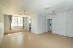  6 State Farm Road Biloela QLD 4715 $219,000 This high-set home has excellent proximity to popular parks, entertainment and sporting venues, schools and hospital. These amenities are virtually on your doorstep, all being within a 5 minute* walk. An air-conditioned, light-filled living room has access via french doors to an eclosed, front verandah. The kitchen is functional with room to move and plenty of storage options. Three bedrooms, all have air-conditioning and built-in robes. Downstairs is a fully enclosed space containing the laundry and secure parking for a single vehicle. The 736sqm* allotment is fully fenced with a large back yard. 