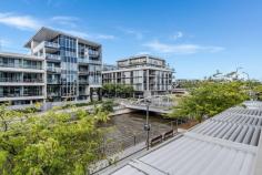  2/21 Eastlake Parade Aurora Kingston ACT 2604 Aurora is certainly one of the Foreshore’s finest apartment complexes and this one bedroom study apartment is a fine example with generous spaces and superb water and lake views from the expansive entertaining terrace. The apartment features generous living and dining spaces with functional Luxe kitchen with stone benchtops, quality appliances & generous storage options. Spacious Secluded master bedroom with generous Built in robes and large luxurious ensuite bathroom flowing out to the entertaining terrace. Study nook, separate powder room /laundry and single car space in secure garage accessed by restricted lift access. Additional features are R/C heating and cooling and polished timber floors and quality carpets and window furnishings throughout. A superb live in or rental opportunity at $600 plus per week. Enjoy the popular Kingston Foreshore lifestyle with so many benefits including walking distance to popular cafe’s bars and restaurants. Also close proximity to the Kingston Shops, Manuka Village, the Parliamentary Triangle and only a short drive to the City CBD and the Canberra Airport. Superb Opportunity. EER 6 Highlights One bedroom with good sized wardrobe space & stylish ensuite Powder room/laundry and study area Modern Luxe kitchen with stone bench tops, integrated fridge, quality appliances and generous storage Designer bathrooms with full-height tiling and stone top vanities Open plan living area opening on to large entertaining terrace with lake views. Reverse cycle heating & cooling to apartment Restricted access basement parking for one car and storage cage. Prime positioning and sought-after lifestyle at the Kingston Foreshore with numerous benefits including short distance to Kingston, Manuka, the Parliamentary Triangle and the CBD. 