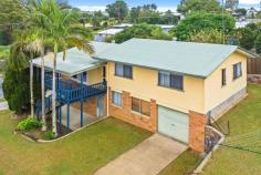  77 Elizabeth St Nambour QLD 4560 This solidly built highset home on an 800m2 block, has good bones and great warmth, and is vacant and ready for a little TLC to make it truly shine; plus, with masses of room under - all at legal height, there is clear potential to create extra living/office space under if desired. The upper level is slightly split and comprises covered front verandah – elevated with pleasant outlook, open plan living and dining, functional kitchen, retro-bathroom, separate toilet, separate laundry, and three bedrooms. The lower level comprises lock-up parking for three vehicles plus additional storage/workshop space. Hardwood timber floors, separate bath and shower in family bathroom, built-ins in two of the bedrooms, and ramp from laundry to backyard clothesline – are existing features; and it is certainly comfortable and liveable 'as is', any updates/improvements can be made over time as budget permits. The block size is well above average and provides huge space for children and pets to play; you may want to put in a pool or shed one day – and the way the house is positioned on the block, there is space at the rear to build a second dwelling/granny flat (stca) and good side access for building works. Located in a well-established part of town within walking distance to Nambour Christian College, local tennis courts, Moss Day Park, and just a few minutes' drive into town – this is a family- friendly locale, with some of Nambour's most beloved heritage homes in and around the neighbourhood. Access to Nambour Connection Road is quick and easy; Maroochydore, Sunshine Coast Airport, the university, and beaches are within a 20-25 minute proximity. Spend the morning at the beach and come home for a BBQ on the deck and a game of backyard cricket.you can live the quintessential Aussie lifestyle here with the big backyard! This is a property that will appeal to a variety of purchasers for several reasons, particularly the versatile options it offers both within home itself and on the block. Highset home on 800m2  3 bedrooms, 1 bathroom Open plan living and dining Functional kitchen & laundry Elevated covered verandah Parking under for 3 vehicles Timber hardwood floors throughout Good bones, needs some TLC Potential rental income of $500-$530/week Could create extra living under Potential for second dwelling (stca) Walk to NCC, local parks & tennis Vacant & ready for next chapter 