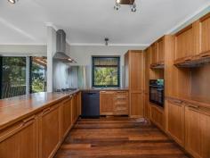  14 Kiel Mountain Rd Woombye QLD 4559 Located in Woombye and perfectly positioned to access the beaches of the Sunshine Coast, State and Private schools, and further beyond to the Hinterland is this 3-bedroom home bursting with potential. Solidly built, this much-loved home has undergone a recent transformation and just needs its new owners to bring their vision for their forever home or savvy investment. Surrounded by lush greenery, upstairs in the property you feel you are in the treetops. And the wide timber deck running the length of the rear of the property offers the perfect vantage point. The deck is also the perfect spot to look over the gorgeous inground pool and large 1472m2 block. • Very private 3-bedroom home • Master leads through sliding doors to the deck • Downstairs, a separate space with huge potential has been created and it leads to the paved entertaining area and the inground pool • Family bathroom with enviable floor to ceiling tiles and free-standing tub • Second bathroom downstairs and incredible storage for the family • Country kitchen forming the heart of the home with servery to the deck, dishwasher, gas cooktop and electric oven and good connection to the dining and living areas • Living area leads through sliding doors to the deck • Hardwood floors throughout • Beautiful inground pool • Double garage with workshop space • Large garden shed/storage • Huge 1472m2 block; plenty of room for the rowdier members of the family to run • Remote controlled entry gate for secure off-street parking • External remote window shutters• Privacy has been created with fencing and clever landscaping Capitalise on the space underneath the home- there's loads of potential here for it to be converted to create dual living, a teenager's retreat or the ultimate entertainment space; the options are endless! 