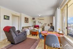  2 / 7 Kirk Avenue Tumut NSW 2720 $369,000 Offered to the market for the first time in almost nine years is this conveniently located and extremely low maintenance two-bedroom unit, positioned in a quiet cul-de-sac and comprising of just three units within the complex. You will love the simplicity, convenience and privacy of this well-maintained unit in the heart of town. Do not miss your opportunity to secure this two-bedroom unit, call today to book your private inspection! Premiere Features: - Two great sized bedrooms positioned to the rear of the plan and boasting built in robes and ceiling fans - Light filtered bathroom with separate bath, separate shower and single vanity - Great sized kitchen with ample bench space, storage options and electric cooktop - Open plan living and dining serviced by split system air conditioning and positioned to take in the elevated aspect, including direct access to the front deck - Separate toilet - Internal laundry with direct external side access - Great sized front deck with an elevated aspect perfect for outdoor entertaining - Very low maintenance rear courtyard with garden shed and clothesline - Single lock up garage with direct private access to the rear courtyard - Guest parking available off street - Cul-de-sac positioning in a small complex of just three units - Walking distance to Tumut retail precinct - Long term tenancy currently tenanted at $250 per week 