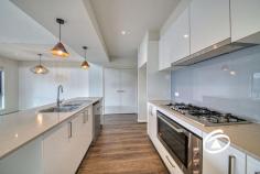  21 Llano Circuit, Berwick VIC 3806 $600,000 - $650,000 Perfectly positioned in a secluded part of Berwick and only a minute’s walk from Sweeney Reserve, this townhouse is sure to impress. Enjoy the best of both worlds with this modern, spacious, low-maintenance 3-bedroom home set back from the main road offering privacy and a calming sense of tranquility. On entry, the main hallway leads you to the fully appointed kitchen with stone benches, dishwasher, 900mm oven, and stove, plus a generous island bar bench that overlooks the extra-large living/dining room and access to the outdoor entertaining area. Upstairs offers a great-sized master bedroom with ensuite, and the two additional bedrooms with built in robes serviced by a central bathroom. The maintenance-free courtyard garden includes a small decking/bar area, garden shed, and paved area, making it easy to entertain. Other features include ducted central heating, two split systems, ceiling fans, a downstairs powder room and a double garage with remote. A perfect maintenance-free lifestyle only moments from everything. 