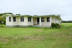  229 Etty Bay Rd Etty Bay QLD 4858 $650,000 229 Etty Bay Road, Etty Bay, Queensland, offers an opportunity to buy your own home and subdivide the land. This is a rare find: 9.58 acres with approval for proposed acreage development. Located on Etty Bay Road and only 5 km from our most popular beach, Etty Bay, Walk to the beach as your daily exercise routine or drive the family for outings and swims in the patrolled, netted beach. Etty Bay is home to our local surf lifesaving club, Etty Bay caravan park, and Etty Bay Cafe, with great meals on offer during the day and evenings. Cassowaries are seen almost every day at our local Etty Bay. 229 Etty Bay Road is only a 5-minute drive to Mourilyan Harbour, where you can launch your boat for a day trip to the Great Barrier Reef or throw the crab pots in the harbour for a fresh feed. The 9.58-acre block of land is a perfectly manicured flat site with minimal water ingress from the local rains and floods. Live comfortably in the four-bedroom house. With a hardwood exterior, large queen-sized bedrooms, a modern U-shaped kitchen, an open lounge/dining room, 1 bathroom, and a large rumpus room at the rear of the house. Soak up the sea breezes on the front verandah and store your boat or caravan in the large, 80-square-meter, powered shed. The house is currently rented for $600 per week. This property will make an excellent investment. With these kinds of returns, let the house pay itself off or take the opportunity presented to you and subdivide.The choice is yours. Live in it, rent it, subdivide it, turn it into a small hobby farm - use your imagination and do what you want to to 