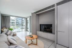  2/21 Eastlake Parade Aurora Kingston ACT 2604 Aurora is certainly one of the Foreshore’s finest apartment complexes and this one bedroom study apartment is a fine example with generous spaces and superb water and lake views from the expansive entertaining terrace. The apartment features generous living and dining spaces with functional Luxe kitchen with stone benchtops, quality appliances & generous storage options. Spacious Secluded master bedroom with generous Built in robes and large luxurious ensuite bathroom flowing out to the entertaining terrace. Study nook, separate powder room /laundry and single car space in secure garage accessed by restricted lift access. Additional features are R/C heating and cooling and polished timber floors and quality carpets and window furnishings throughout. A superb live in or rental opportunity at $600 plus per week. Enjoy the popular Kingston Foreshore lifestyle with so many benefits including walking distance to popular cafe’s bars and restaurants. Also close proximity to the Kingston Shops, Manuka Village, the Parliamentary Triangle and only a short drive to the City CBD and the Canberra Airport. Superb Opportunity. EER 6 Highlights One bedroom with good sized wardrobe space & stylish ensuite Powder room/laundry and study area Modern Luxe kitchen with stone bench tops, integrated fridge, quality appliances and generous storage Designer bathrooms with full-height tiling and stone top vanities Open plan living area opening on to large entertaining terrace with lake views. Reverse cycle heating & cooling to apartment Restricted access basement parking for one car and storage cage. Prime positioning and sought-after lifestyle at the Kingston Foreshore with numerous benefits including short distance to Kingston, Manuka, the Parliamentary Triangle and the CBD. 