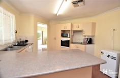  12 Bauerle Ct Biloela QLD 4715 $335,000 Ideally located in an elevated, quiet cul-de-sac, and just a short stroll to ‘Tom Dawson Park’, the ‘Lions Park’ and schools, this home will provide an ideal location for families to grow. You will be pleased by the functional layout with the walk-through kitchen being the centre of the home and overlooking the private patio making entertaining a pleasure. The dining room and lounge areas are generous in size on either side of the kitchen and keeping communal areas separate to the bedrooms. There are 4 bedrooms, 3 with built in cupboards and the master with a walk-in robe and ensuite. Air-conditioning features in the living room with evaporative cooling system throughout. Surrounding the home are established privacy gardens and a garden shed on a 792m2 allotment. Additional features include secure fencing and a double garage. 