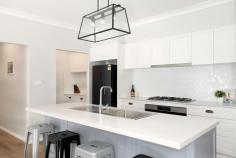  84 Clanwilliam Street Blackheath NSW 2785 $1,350,000 - $1,450,000 Swathed in contemporary elegance, this 'as new' custom built home is perfectly positioned in the heart of Blackheath village, a short walk to cafes, boutique shops, schools, parks and transport. Bathed in natural light, with bright, open interiors the property features, a large covered outdoor entertaining area, spacious kitchen with stone bench tops & butlers pantry, and an attractive main bathroom with freestanding tub. FEATURES BREAKDOWN; Just 150m from the village Large modern kitchen with stone benchtops & butlers pantry Open plan kitchen/dining/family opening up to a large tiled outdoor entertaining area Two separate living areas Family room with cosy gas fireplace Separate lounge/media room opening up to a north facing courtyard 4 bedrooms (3 with walk-in wardrobes and large built-in to remaining bedroom) Master bedroom with walk-in robe and ensuite with double vanity and double shower Gorgeous contemporary bathroom with freestanding tub and separate shower Double lock up garage with internal access Landscaped gardens with sandstone block retaining walls. Ducted reverse cycle AC 6.6kw Solar system Situated in an ideal location in the heart of Blackheath village and bursting with charm, a property of this caliber is sure to attract a lot of interest. 