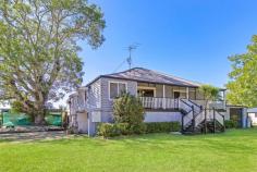  2 Holly Green Cres Palmwoods QLD 4555 $800,000 This highset Queenslander on an expansive 1318m2 corner block is quite an iconic home – anyone travelling between Palmwoods and Woombye would pass this on their journey and is sure to have noticed it, it has wonderful presence, a sense of history, and is part of the local landscape. Across the upper level it comprises full length front verandah, three bedrooms, one bathroom, study, formal lounge, retro-kitchen with adjacent dining, and north facing sunroom; the lower level comprises masses of storage/multipurpose space, second bathroom, laundry, lock up garage, three carports, and covered alfresco entertaining – also north facing. Tightly held since 1976, parts of the home are still in mostly original condition and there is clear potential to refresh and apply some TLC to truly make it shine. Existing features include high ceilings, VJ walls, floorboards (under coverings), split system air-conditioning in lounge, ceiling fans, window hoods above west facing windows, solar hot water, and solar power. The grounds are flat and fully usable with partial fencing – there is plenty of room for a pool and or a large shed, if desired; and even the possibility of building a second dwelling/granny flat (stca). Low maintenance, the lawn just needs a regular mow to keep it looking neat and tidy, and there are some established shady trees that enhance overall ambience and street appeal. Located within walking distance of Kolora Park (duck pond), Palmwoods Bowling Club, and the village itself – you can take a pleasant stroll into town to dine out, do your banking, pick up some groceries, or enjoy a beer at the landmark hotel. There is a bus stop out the front and it's only a few minutes' drive to local private and public schools, and 20 minutes to the coast. Renovators, builders/tradies, developers and buyers who appreciate homes of this vintage, and the warmth and charisma they embody – should act quickly; this is a magnificent block of land, so close to town, offering several possibilities, with a character home the icing on the cake. Frist time to market for 47 years! What lies ahead for 2 Holly Green Crescent? You can decide. Highset Queenslander on 1318m2 corner block 3 bedrooms, 2 bathrooms, study, formal lounge Full length front verandah, north facing sunroom Covered ground floor alfresco entertaining at rear Masses of multipurpose/storage space under SLUG + 3 x carports + masses of onsite parking Clear potential to renovate/rebuild & value-add  Possibility to build a second dwelling (STCA) Fully usable grounds – room for a pool & shed Walk to town, rail, parks, dining, and bowls club Just minutes to local public and private schools 1st time to market since 1976 – be quick to act! 