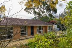  16 Broughton St Bundanoon NSW 2578 $950,000 Great family home, investment or potential downsizer with fabulous living spaces overlooking the front garden and well fenced rear yard. Both living areas are connected via the centrally located eat-in kitchen which also adjoins the huge rear deck under roof. The kitchen offers electric cooking, dishwasher and lovely views over the rear yard with space to extend if necessary. The home extension has been carefully considered and could also be the perfect space for teenagers or elderly in-laws with separation from the front wing of the home which also houses beds and living spaces. Potential for 5 beds and a home office, an alternate configuration would be 3 beds, dressing room, cosy lounge / library with electric fireplace plus study, there are endless options with this floor plan. The office is well positioned overlooking the rear garden and bathed in sunshine making this a great work from home space. There are two generously proportioned bathrooms, both in good condition, one of which offers a huge corner spa bath, separate toilet, huge vanity, shower and laundry facilities. The second bathroom offers a walk-in shower, vanity and toilet with heated towel rails an added bonus. All town services available with gas ducted under floor heating, 2 x split systems, ceiling fans and solar panels to help offset costs. Excellent north easterly aspect to the rear garden. The home also offers an attached double garage with workshop space and internal access plus auto panel lift door. The level well fenced rear yard also houses a small timber clad shed, potential cubby house or garden storage if needed. The residence is positioned in a quiet street within walking distance to the village shops and station offering a lovely elevated local outlook from the rear deck. Situated behind the front tiered garden which ensures privacy and a green outlook from the front living areas and bedrooms. This solid home offers loads of potential to further renovate, simply enjoy as is or turn into a good investment property. 