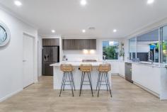  3 Conway St Upper Kedron QLD 4055 Perfectly positioned high with a sweeping mountain vista, this spacious, elegant residence offers relaxed living for families of all sizes. With ducted a/c throughout, great natural light, multiple living zones with ample separation, this home is the ultimate modern family haven. You'll be immediately impressed by the extra wide entry hallway leading past the gorgeous timber staircase to a number of places in which your family can unwind with the massive open-plan living space & media room on the lower level ensuring there is living separation when desired. The kitchen is designed with entertaining in mind with the inclusion of superb storage, gourmet appliances, large stone island bench & the well-equipped butler's pantry offering extended storage. Indoors merges out to your poolside haven including tiled covered entertaining flowing to a heated salt-water pool alongside lush lawns & landscaped gardens ideal for enjoying beautiful sunsets & views all year round. The upper level of the home provides an extra large lounge room & 4 generously sized bedrooms (2nd bedroom with walk-in-robes) whilst the master also boasts a luxurious ensuite plus 2 separate walk in wardrobes. The family bathroom is also on this level, with matching quality fit out & separate bath tub/shower. Additional features include a spacious study downstairs, large laundry with built-in cabinetry, powder room with third toilet, superb storage, walk-in linen and double remote garage with drive-through rear door. Designed to impress at every turn, this exceptional residence provides you an amazing opportunity to buy today or at auction so make sure you're at the next open home. Features: Poolside entertaining haven alongside heated salt-water pool, lush lawns & manicured gardens MyAir ducted a/c throughout, great natural light, multiple living zones with ample separation Massive open-plan kitchen/living/dining space with well equipped butlers pantry Large media room downstairs & huge lounge room upstairs 4 generous bedrooms with built-in-wardrobes, 2nd bedroom with walk-in-robe Master suite with 2 seperate walk in wardrobes & luxurious ensuite Spacious study downstairs or potential 5th bedroom Laundry with built-in cabinetry Powder room with 3rd toilet Superb storage including walk-in linen cupboard Double garage with remote access Canadian Solar KU Power 300 split cell 6.6KW & smart lighting Heated salt-water pool (heat pump) & solar heated shower by the pool Fully irrigated manicured lawns & gardens Fully fenced with side access & garden shed Location: 500m to local park 600m to Bus stop 1.6km to C&K Upper Kedron Childcare Centre 1.6km to local shops & cafes [coming soon] 2.9km to St Andrews Primary School 3.2km to Habitat Early Learning Centre 3.7km to Ferny Grove Primary School 3.9km to Ferny Grove Shopping Village 3.9km to Ferny Grove State High School 4.7km to Ferny Grove Train Station Upper Kedron is a highly sought after suburb on the North Western fringe, approximately 13km from the heart of the Brisbane CBD. A child friendly area with neighbouring parklands, bush walking and great primary/ high schools as well as day care facilities. The transport infrastructure with the Ferny Grove rail corridor and adjoining bus services provides an excellent service for commuters to the CBD and surrounding suburbs 