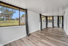  10 Railway Avenue Portland NSW 2847 $569,000 Freshly renovated 4 bedroom home with nothing left to do on the interior apart from unpack and enjoy. This surprise package features a sunny front veranda, open plan kitchen with stone benches and stylish Smeg appliances, a spacious living area, sunroom and internal laundry with stone benches. The floating floorboards tie in the neutral colour palette and modern influences are present throughout the entire home including the bathroom that highlights a freestanding bath. Positioned on a generous sized parcel of land that is complete with pergola, carport and a double garage. The easy care yard makes maintenance a breeze, giving you more time to relax and enjoy your new surroundings. Don't miss your chance to own this beautiful home! 