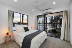  8 / 9 Jodie Court Mermaid Waters QLD 4218 Presenting a stunning architecturally designed renovation, this three-bedroom, three-bathroom townhouse is all brand new, offering sophisticated low maintenance living with spectacular water views in the heart of Mermaid Waters. Showcasing a blend of coastal contemporary style with urban industrial accents, this chic waterfront townhouse boasts a designer kitchen featuring polished concrete benchtops, ambient lighting, and custom cabinetry. Open plan living flows with large windows overlooking the wide water views and an abundance of natural light. All three bedrooms feature custom-made built-in storage, downstairs you'll find a bedroom/multi purpose room with own entry, and two bedrooms upstairs are ensuited boasting water views. Situated at the end of a cul-de-sac in a small complex of 15 with low body corporate, this waterfront townhouse also comes with a single lock-up garage. Meticulously finished with new paint, flooring, lighting, and fittings throughout, there is absolutely nothing to do but move in and enjoy this luxurious coastal abode. Situated an easy walk to Pacific Fair Shopping Centre, and minutes to our beautiful beaches, this is a great opportunity for investors, first home buyers or downsizers. Features: * Architecturally designed renovation * Open plan living and split system air-conditioning * Designer kitchen features waterfront views, custom cabinetry, concrete benchtops, splashback lighting and dishwasher * Three bedrooms with built in robes and custom shelving, the master bedroom boasts a balcony and both bedrooms upstairs feature an ensuite and waterfront views * Three stylish bathrooms * Large windows invite natural light and sea breezes * New paint, lighting, flooring, and fittings throughout * Attic storage area * Single lock-up garage * Boutique complex with low body corporate fees approx $56 per week Location: * 750 metres to Pacific Fair Shopping Centre, restaurants & cafes * Walk or ride to Broadbeach entertainment precinct and patrolled beaches * 5 minutes' drive to local schools and Pizzey Park Sporting Complex 