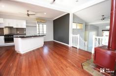  7 Kariboe St Biloela QLD 4715 $350,000 Welcome to 7 Kariboe Street, this split-level home has a lot to offer, including vacant possession and a central location with only a 2-minute walk to Woolworths and Biloela town centre. Let’s start with the bedrooms; there are 4, 2 with cupboards, the main with a WIR and 3 of them have split system air-conditioners. There are also 2 additional rooms that could be used as bedrooms, the options are there if you need a 5th or potentially a 6th bedroom, alternatively you could use these spaces for a home office and storage room. The kitchen features neutral colour tones, an island bench and dishwasher, it flows into the dining area then downstairs to the air-conditioned lounge room. Upstairs is the main bathroom, with a step-in shower and separate tub, downstairs you’ll find a 2nd toilet in the functional laundry. Outside you will be pleasantly surprised by the multiple entertainment areas, one of which includes a bar and built in bench seat, all areas are overlooking the yard space that has child and pet friendly fencing. In addition, you’ll find a large 3 bay powered shed, garden shed, rear lane access, undercover carports at the front and rear of the property and a 680L rainwater tank. The best part is that you can move straight in without waiting for a lease to expire! Your personal inspection can be arranged by calling Amanda or Ross at First National Biloela. 