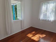  2 Breen St East Innisfail QLD 4860 $269,500 2 bedroom cottage in the Queenslander style that has just undergone renovations, situated on a corner with two street entrances. This house is ready to move into; if you want the charm of a Queenslander but only want a small space to maintain, this is the one. Features: * Polished timber floors * High ceilings and tongue and groove walls * A combination of louvers and casement windows, some with fly screens. * 2 Bedrooms, with a box air conditioner in the master bedroom * Ceiling fans throughout. * 1 Bathroom with a separate toilet * A brand-new upright stove in a modern kitchen * New curtains throughout * Single lock-up garage. With an upgraded roof. * The main roof is approximately 10 years old. * Pathways leading to the garage and a paved front yard * Laundry downstairs * Small lot in a flood free zone —only 506 square meters. * New 125 litre electric hot water system * R4 ceiling insulation has just been installed - making the house very cool inside. The exterior of the cottage walls have been sanded and repainted, and all the casement windows have been taken out, sanded, and re-fixed with all new screws. The utmost care has been taken during the renovation stage to retain original features of the cottage. Interior walls and ceilings have been freshly painted with mould and fungal resistant paint, making them bright and white. The yard has a cool feeling thanks to the mature trees that surround the house and let filtered light shine through. A recent professional pest inspection has reported that there were NO active pests detected, and for further peace of mind a termite perimeter treatment was completed in May 2023. This cottage is clean and tidy and walk in ready. 