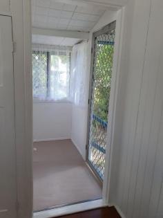  2 Breen St East Innisfail QLD 4860 $269,500 2 bedroom cottage in the Queenslander style that has just undergone renovations, situated on a corner with two street entrances. This house is ready to move into; if you want the charm of a Queenslander but only want a small space to maintain, this is the one. Features: * Polished timber floors * High ceilings and tongue and groove walls * A combination of louvers and casement windows, some with fly screens. * 2 Bedrooms, with a box air conditioner in the master bedroom * Ceiling fans throughout. * 1 Bathroom with a separate toilet * A brand-new upright stove in a modern kitchen * New curtains throughout * Single lock-up garage. With an upgraded roof. * The main roof is approximately 10 years old. * Pathways leading to the garage and a paved front yard * Laundry downstairs * Small lot in a flood free zone —only 506 square meters. * New 125 litre electric hot water system * R4 ceiling insulation has just been installed - making the house very cool inside. The exterior of the cottage walls have been sanded and repainted, and all the casement windows have been taken out, sanded, and re-fixed with all new screws. The utmost care has been taken during the renovation stage to retain original features of the cottage. Interior walls and ceilings have been freshly painted with mould and fungal resistant paint, making them bright and white. The yard has a cool feeling thanks to the mature trees that surround the house and let filtered light shine through. A recent professional pest inspection has reported that there were NO active pests detected, and for further peace of mind a termite perimeter treatment was completed in May 2023. This cottage is clean and tidy and walk in ready. 