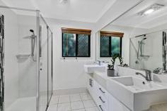 58 Countryview St Woombye QLD 4559 $850,000 Sitting tall and proud on an elevated 1009sqm landscaped block is this open-plan high-set home. Boasting spectacular views of the surrounding area, as well as a spacious floor plan and large backyard, and offering lots of scope to add further value this property is sure to impress a wide range of property buyers. Inside you'll discover stunning timber-look flooring underfoot, muted colour tones and large tinted windows that allow natural light to filter in whilst also framing the picturesque views. The proportional kitchen with framed view of the back yard , features ample preparation and storage space and stainless steel appliances including a dishwasher and a 900mm stove and gas cooktop. There is a breakfast bar, perfect for casual meals, as well as an adjacent open-plan living and dining room that feature split system air-conditioning. The air-conditioned master suite features a walk-in robe and ensuite, while the other two bedrooms both feature built-in robe and are serviced by the main bathroom with a separate toilet. There is also an additional room that could be used as a bedroom, home office or media room, depending on your needs. Under the house, which is legal height, there is secured parking for two cars as well a a huge storage area that already has some plumbing ready to be built in, to add serious value and versatility to the home.. There is also side access to the rear of the property where there is a fantastic 9 x 6m shed with double remote controlled roller doors and due to its size the block would also suit a granny flat (stca). The terraced gardens surrounding the home feature a variety of native trees, plus there is lovely lawn space for the kids and pets to play and still room for a pool (stca) Adding further appeal is the 3.6kw solar system, the solar hot water system and that the home is set up on town water and sewerage amenities. Shops, schools and amenities are all moments away, as is access to the Bruce Highway for those who commute for work. 