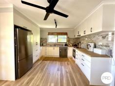  36 Katandra Street Boyne Island QLD 4680 $590,000 Stunning refurbished 4 bedroom home inside plus office plus second living area in an established area of Boyne Island. Two stories with 6X9 Colorbond shed with double doors and a single garage with entrance into the home plus in ground swimming pool. Spacious area for entertaining guest situated on 912m2 sized block, it looks and feels as spacious as it sounds! This property is idea for the family who needs that extra space with second living area plus kitchenette on the lower level. Minutes to the Boyne River for fishing and the boat ramp, plus school bus pick available in the street to locals schools. Plenty of car parking in the front driveway for boats, and caravan plus extra vehicles. Upstairs:  Three bedrooms with built-in robes, ceiling fans, and spacious rooms.  Kids playroom/sunroom with access through glass sliding door to the main bedroom  All of the internal doors to the rooms have been updated and new door handles  Cozy lounge room with feature built-in shelving  Main bathroom with vanity, bath over shower, separate toilet, and linen closet floor to ceiling tiles  Modern renovated kitchen with up-to-date appliances & perfect bench space for cooking  Tidy and presentable throughout, visually appealing.  New timber look laminate, water resistant flooring and freshly painted inside throughout .  Sliding glass doors to the back Patio area overlooking the backyard.  Internal timber stairs inside and back external stairs to the back area Downstairs:  Open plan media/teenage retreat area with built-in kitchenette.  Study room or use as required for extra guest space or 4th bedroom  Laundry set off the back patio easy access to hang out the clothes  Additional bathroom with toilet, shower over bath, and vanity.  Spacious entertaining area overlooking the inground pool  BBQ-style area with new bench timber top ideal for outdoor entertaining  Space for a fire pit to enjoy those winter nights  Kids fairy garden area with little cubby and veggie gardens.  Established gardens with plenty of shade.  Large pool area with extra space for a table and chairs.  Plenty of shade for enjoying summer months with the family.  Colorbond garage and side access with ample parking areas.  Short drive to Boyne Island river, boat ramps, skate park, walking paths, and local parks.  Bonus Solar power system with 35 panels and 12.95kw 