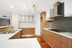  44 Starbush Road Bandiana VIC 3691 $809,000 Presented with beautiful modern colours throughout and low maintenance in mind, this well-appointed home of 27.75 squares on an elevated 766m² allotment has an abundance of space and Spacious living zones. As you step inside, you will be greeted by a spacious living area, perfect for entertaining guests or relaxing with your family. The modern kitchen with ample storage space, and a large island bench, making it a dream for any home chef. The 5 bedrooms in this property are generously sized and feature built-in wardrobes, ensuring plenty of storage for your belongings. The master bedroom with walk in robe boasts a luxurious ensuite with corner spa, providing a private oasis for relaxation. With 2 additional bathrooms, there will never be a queue for the shower in the morning rush. Each bathroom is beautifully designed with contemporary fixtures and finishes, providing a touch of elegance. This property also offers a low-maintenance backyard and large paved alfresco perfect for entertaining and relaxing and for those who desire a beautiful outdoor space without the hassle of extensive upkeep. Located in the desirable suburb of Bandiana, this property is close to Bunnings Centre, Albury link ensuring convenience and only minutes from Wodonga. The oversized double garage will be a great asset and also has back yard access and space for the trailer. Enjoy the many extras including ducted gas heating, evaporative cooling & ceiling fans throughout, walk in linen press and transferable 2 KW solar system. The steel frame property was by by JG King in September 2008. 