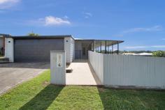  2 DENISE COURT BEACONSFIELD QLD 4740 $465,000 Centrally located in a quiet cul-de-sac in the popular suburb of Beaconsfield, this renovated property offers new owners a convenient address on an elevated, spacious corner block, closely positioned to a variety of schools and other essential services like shopping centres, a medical centre, recreational parks and sporting facilities - everything a young family or retired couple could ask for! Clearly visible on arrival is the large, covered verandah - a feature that extends along the front of the home & primely positioned to catch beautiful breezes while watching the kids play safely in the fenced yard. The entire home boasts covered concrete surrounds plus a double garage that, combined with the verandah, provides all-weather access to the home whilst being protected from the elements! The fully fenced yard acts as an encore to the front entry, where you enter into the open plan, super-sized, air-conditioned lounge/dining/kitchen area. The neutral & well-designed kitchen has been renovated in recent years; the paint is fresh & modern; the tiled flooring is cool & very easy-maintenance; & the big lounge will be fantastic for family movie nights or sleepovers for the kids. As you move through the home, it becomes obvious that the owners have carefully considered the needs of a busy family with the design & interior layout to provide comfort and space for all occupants.The large kitchen contains modern cabinets, a pantry cupboard and ample benchtops, including a breakfast bar for those busy weekday mornings or lazy pancake weekends. The chef in the family will be inspired by the stunning stainless-steel appliances, including the oven, cooktop, rangehood and dishwasher. Feel safe with the generous number of security screens throughout the home, including two large sliding doors in the living room that invite the same cooling breezes from the verandah, giving lovely air flow & cross ventilation throughout the entire home. The three spacious bedrooms feature split system air-conditioning, timber-look floors, built-ins, ceiling fans, and large security-screened windows. Adjoining the master room is a large, two-way bathroom that acts as the ensuite & includes a luxurious corner bathtub, vanity & toilet. The most stunning feature of the home is the Brand New 2nd bathroom that has been cleverly designed to suit the needs of the whole family! With floor-to-ceiling tiles around the deep bathtub & shower recess, new owners will have the pleasure of no glass to clean! The practical & common-sense design continues to include a cabinetted laundry behind mirrored sliding doors that have not skimped on useful bench space & linen storage. With the laundry in the bathroom, the design was purposely intended to catch kids' clothes in the washing machine before they piled on the floor! This bathroom is beautiful & has literally just been completed before listing to market for the benefit of new owners! The back door, again with security screening, leads to the block brick shed & a large concrete-floored outdoor area, ideal for family celebrations, barbecues or entertaining. Tucked into the back corner of this block is an asphalted pad which would be perfect for storage of a caravan or boat, which can be reversed in directly from the street & sits behind lockable double gates. The lawn is spaced in retained sections with quality treated logs which not only provide for handy seating but also ensure easy mowing & a fantastic aesthetic look! Many hours have been spent completing retaining walls and establishing landscaping to beautify this yard which acts as a great playground for kids & pets! Being positioned as a corner block means this large block has access from two streets; one that leads to a secure boat or caravan pad behind double gates; the other past the house to the rear shed that provides valuable storage. This second street entrance also leads into a quiet & very family-oriented culdesac with wonderful neighbours & very little traffic. There is so much on offer at this outstanding address. If you are looking for a beautiful home in a great area with fabulous neighbours, don't hesitate to contact Robyn to arrange your inspection of 2 Denise Court, Beaconsfield. 