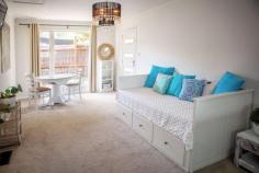  158 Kars Street Frankston South VIC 3199 $990,000 - $1,089,000 Inviting an element of play, this architectural home prioritises leafy aspects across an effortlessly welcoming environment. Zoned for both Overport Primary and Frankston High School, an array of living and dining spaces ensure flexibility deep within Frankston South. Perched high on the hill away from through-traffic, gentle birdsong accompanies a walk along Sweetwater Creek towards Oliver's Hill and the glistening waters of Port Phillip Bay. Met with a scarlet entryway, timber flooring sprawls throughout the living domain with a choice of three beautifully refreshed interiors including a privately accessed space ideal as a home office. Continuing a traditional design, the kitchen sits amongst an L-shaped family domain welcoming pops of greenery across stone bench-tops, gas stove, wall oven, and a breakfast bar welcoming conversation throughout the home. Enlarging the dining zone, an expanse of sheltered timber decking enjoys the afternoon sun elevated above the rear yard with space to watch the children and pets play. Extending in an east-west direction, three bedrooms include built-in robes, before a unity of textured tiles and timber accents sprawl across the master ensuite and shared bathroom. Split-system air conditioning and gas ducted heating offer climate control, with a single carport for off-street parking. Characterising the peaceful surrounds of Frankston South with a proximity to the heart of Frankston's every amenity, the sandy shoreline reveals a sprawl of recreational, retail and medical amenities within easy access for all. 