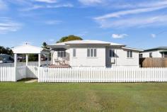  64 CANBERRA STREET NORTH MACKAY QLD 4740 $435,000 This divine property offers buyers the option of not spending a cent or lifting a finger for many years into the future - EVERYTHING is done, a full house renovation took place back in 2021, giving this charming cottage-style home a new breath of life! Once arriving, you will notice the fabulous street appeal, a commanding corner block with stylistic white picket fences and an arbour that shouts, "Welcome!". You will begin to imagine yourself enjoying a morning coffee on the front timber sun deck the moment you pull up. Upon entering, be greeted by the large lounge room boasting immaculately polished timber floors and original casement windows that invite beautiful natural light that bounces off the classy neutral colour pallet. The elegant choice of materials & colours is continued throughout the rest of the home. Continuing off the lounge room, you are invited into the magnificent modern kitchen that is fitted with plenty of cabinets, bench space, a breakfast bar & a double fridge cavity, plus quality appliances such as an electric four-burner cooktop & oven. The high ceilings throughout the home create such a beautiful fresh atmosphere, 64 Canberra St is a home you simply don't want to leave! The four bedrooms are found down the long hallway, which also comes off the stunning lounge room. The master bedroom is incredibly well sized, fully airconditioned & would accommodate a king bed with ease, the best feature of this room is the incredibly large walk-in wardrobe. Large enough for a makeup table & would accommodate any fashionista's extensive clothing pieces. Beds two & three are generously sized with air-conditioning & built-ins. Bed four offers a beautiful timber bookshelf wall & would be very suitable for a kid's room, nursery, or office. The main bathroom is adjacent to the master bedroom & offers a large semi-walk-in shower with an incredibly easy-to-clean wet wall & strip of feature tiles. The stunning oak look cabinetry & neutral tiles continues the elegant theme in the bathroom. Via half stairs from the kitchen, you will find the tiled downstairs area, which grants access to the massive backyard via glass sliding doors. This area is quite large & currently houses a dining room table, second shower, toilet & laundry. For families, it would make a wonderful child's playroom & a smaller dining table could easily be relocated into the large lounge area. $435,000 Superbly Renovated Home In North Mackay This divine property offers buyers the option of not spending a cent or lifting a finger for many years into the future - EVERYTHING is done, a full house renovation took place back in 2021, giving this charming cottage-style home a new breath of life! Once arriving, you will notice the fabulous street appeal, a commanding corner block with stylistic white picket fences and an arbour that shouts, "Welcome!". You will begin to imagine yourself enjoying a morning coffee on the front timber sun deck the moment you pull up. Upon entering, be greeted by the large lounge room boasting immaculately polished timber floors and original casement windows that invite beautiful natural light that bounces off the classy neutral colour pallet. The elegant choice of materials & colours is continued throughout the rest of the home. Continuing off the lounge room, you are invited into the magnificent modern kitchen that is fitted with plenty of cabinets, bench space, a breakfast bar & a double fridge cavity, plus quality appliances such as an electric four-burner cooktop & oven. The high ceilings throughout the home create such a beautiful fresh atmosphere, 64 Canberra St is a home you simply don't want to leave! The four bedrooms are found down the long hallway, which also comes off the stunning lounge room. The master bedroom is incredibly well sized, fully airconditioned & would accommodate a king bed with ease, the best feature of this room is the incredibly large walk-in wardrobe. Large enough for a makeup table & would accommodate any fashionista's extensive clothing pieces. Beds two & three are generously sized with air-conditioning & built-ins. Bed four offers a beautiful timber bookshelf wall & would be very suitable for a kid's room, nursery, or office. The main bathroom is adjacent to the master bedroom & offers a large semi-walk-in shower with an incredibly easy-to-clean wet wall & strip of feature tiles. The stunning oak look cabinetry & neutral tiles continues the elegant theme in the bathroom. Via half stairs from the kitchen, you will find the tiled downstairs area, which grants access to the massive backyard via glass sliding doors. This area is quite large & currently houses a dining room table, second shower, toilet & laundry. For families, it would make a wonderful child's playroom & a smaller dining table could easily be relocated into the large lounge area. The massive 802 sqm block offers two street access, a single bay carport, a garden shed & stunning large tree that provides a great amount of shade & would be perfect for a children's cubby house. 64 Canberra St is a stunning home in a great location, minutes from St Joseph's school, Evans St IGA, takeout & many local businesses. You are also a short drive away from Mt Pleasant shopping centre, the Harbour & quick access to the city heart via Forgan Bridge. This home is ready & waiting for its new lucky owner. 