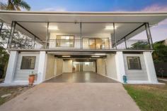  8 Amsterdam Cct Wagaman NT 0810 Sitting on 731sqm block, this home is ideal for the 3 generation family and within close proximity to Casuarina Shopping Square, Library, Olympic Pool and the overabundance or Northern Suburb amenities. A fabulous verandah surrounds 3 sides of the home whilst mature tropical vegetation not only delivers a picturesque outlook but provides privacy from neighbouring properties. A modern gas kitchen with a spacious dining room is perfect for family meals whilst the partially separate lounge is accessed by a double doorway from the dining room. There are 3 huge bedrooms accentuated by light on the upper lever as well as a large bathroom and a separate toilet with hand basin. Downstairs 4 more expansive bedrooms - almost as big as a studio-apartments enjoy self-contained modern facilities custom-built for the convenience of the occupants. In addition the property benefits from undercover parking for 4 vehicles, a good size garden shed and delightful private lawned back yard. Property Features: - 7 bedrooms with extra living area downstairs - Modern kitchen with stainless steel appliances - Separate bathroom and toilet upstairs - Two full toilet and bathrooms downstairs - Fully Air-conditioned bedrooms - Good size Garden shed - Fully fenced with blank canvas back yard - Convenient to hospital, university, shopping centres, public transport The bathroom is functional with a shower, and two separate toilet for added convenience. Plus, an internal laundry that has a large linen cupboard. Louvre windows and security screens throughout and situated on a large block, this property is in the ideal location, just minutes to Casuarina Shopping Centre, Schools and more! Located within walking distance to Casuarina Square, this property would be ideal for both owner occupiers with extended family or savvy investors. 