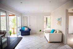  158 Kars Street Frankston South VIC 3199 $990,000 - $1,089,000 Inviting an element of play, this architectural home prioritises leafy aspects across an effortlessly welcoming environment. Zoned for both Overport Primary and Frankston High School, an array of living and dining spaces ensure flexibility deep within Frankston South. Perched high on the hill away from through-traffic, gentle birdsong accompanies a walk along Sweetwater Creek towards Oliver's Hill and the glistening waters of Port Phillip Bay. Met with a scarlet entryway, timber flooring sprawls throughout the living domain with a choice of three beautifully refreshed interiors including a privately accessed space ideal as a home office. Continuing a traditional design, the kitchen sits amongst an L-shaped family domain welcoming pops of greenery across stone bench-tops, gas stove, wall oven, and a breakfast bar welcoming conversation throughout the home. Enlarging the dining zone, an expanse of sheltered timber decking enjoys the afternoon sun elevated above the rear yard with space to watch the children and pets play. Extending in an east-west direction, three bedrooms include built-in robes, before a unity of textured tiles and timber accents sprawl across the master ensuite and shared bathroom. Split-system air conditioning and gas ducted heating offer climate control, with a single carport for off-street parking. Characterising the peaceful surrounds of Frankston South with a proximity to the heart of Frankston's every amenity, the sandy shoreline reveals a sprawl of recreational, retail and medical amenities within easy access for all. 