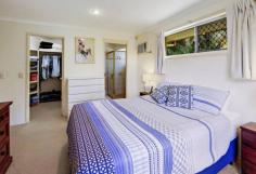  12 Broadwater Cl Bargara QLD 4670 Tucked away in the prestigious cul-de-sac of Bargara Lakes, this statement piece home offers a rare combination of beachside living mixed with the tranquillity only the ‘Lakes’ can offer. Welcome to 12 Broadwater Close, a 4-Bedroom, 2-bathroom, 2-Car Garage home boasting a uniquely generous layout throughout and complimented by vaulted high-set ceilings. This privately secured home offers a broad spectrum of features including manicured gardens with landscaped features, High-Speed NBN fibre to the home, private Jetty overlooking the lakes, and all the essentials positioned in your dream location. Imagine waking up to the sunrise overlooking over the Bargara Lakes, listening to the bird’s chirp in the crisp morning air. You have finished your coffee and have decided on a warm morning walk by the ocean which is only 1.2k away. After the serene walk you find yourself feeling peckish and decide to retire to lunch at Bargara Lakes Tavern, which is under 1k from your new home. Location, location, location! Features at a Glance • 4 Bedrooms. 1 Standard, 2 including built ins & fans, all newly carpeted. • Master boasts Walkin Robe & En suite. • 2 Separate family room spaces • Privately secure/fully fenced. • NBN Fibre to the home yielding 260+MB/s • Power underground to home. • Vaulted high-set ceilings. • Located in are Lake’s cul-de-sac – minimal neighbours, prestigious location. • Under 15 minutes walking distance to both beach & Bargara Lakes Tavern. • Landscaped and manicured yard/gardens • Private jetty overlooking the Lakes. • Full-length undercover concreted stumped entertainment area. • Built with Italian Hardwood. • Much more! 