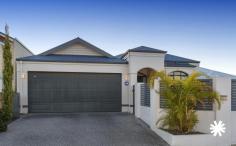  181 Fern Rd Wilson WA 6107 $800,000 Situated on the tranquil Riverside of Wilson, this exceptional family home offers an enchanting facade complemented by a private, secure front courtyard and a double lock-up garage in sophisticated shades of grey. An abundance of natural light permeates the expansive open windows, creating a welcoming and warm atmosphere. This spacious residence features four bedrooms and two bathrooms, including a master bedroom that serves as a true sanctuary. The master suite boasts a spacious ensuite with a luxurious spa bath and a guest toilet. Each bedroom comes equipped with built-in wardrobes and cozy carpets, while immaculate 600 mm floor tiles adorn the rest of the home. The large open-plan kitchen and living area are perfect for both everyday living and entertaining. The kitchen itself is impressive, complete with a five-burner gas cooktop, electric oven, dishwasher, and a plumbed water outlet for your refrigerator, providing the ideal setting for unleashing your culinary creativity. Enjoy year-round comfort with reverse cycle air conditioning throughout the house, complemented by a gas point for convenient heating. Step outside into the backyard oasis and discover a private haven highlighted by a stunning alfresco area, perfect for hosting gatherings with family and friends. The low-maintenance gardens, fully reticulated, are beautifully finished with crafted limestone pavers, ensuring effortless upkeep. Safety is of utmost importance, and this property offers a double garage with an additional spacious storage area at the back for all your handyman needs. At the back of the property you’ll love the mature lemon tree, a garden shed, and extensive limestone paving and retaining walls. Additionally, a separate drying area is designated for your laundry requirements. Positioned just 11 km from Perth CBD, this home enjoys proximity to Curtin University, Technology Park, Canning River, and a short drive to Carousel Shopping Centre. Don’t miss out on this wonderful opportunity to acquire this delightful property in the heart of Wilson. 