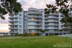  Unit 207/1 Roseby St Drummoyne NSW 2047 This convenient level-entry apartment in a luxury complex delivers exceptional space and comfort. Situated on the ground floor in East Drummoyne's exclusive Marina Point Apartments, the two-bedroom home features a generous and low-maintenance layout that's designed for a relaxed lifestyle. Unwind in the sunlit lounge with floor-to-ceiling glass doors that create a seamless flow between the living space and a wraparound entertainer's terrace framed by tropical greenery. Two spacious bedrooms include a light-filled master with built-in-robe and designer marble ensuite with spa bath. Head outdoors and explore local waterfront parks and walking trails, or make use of the onsite resort-style facilities, such as an indoor heated pool, and gym. This sought-after address is only 50m to Birkenhead Pt retail, 190m to Drummoyne Sailing Club, and 500m to the famous Bay Run. • High-quality two-bedroom apartment in a coveted waterfront location • Bright and airy open-plan living and dining space with seamless flow to terrace • Quality gas kitchen featuring Blanco gas oven, and stone benchtops • King-sized master includes built-in robe, and ensuite with shower, spa bath and vanity • Spacious guest bedroom featuring built-in robe and leafy outlook • Large internal laundry with room for washer and dryer, plus storage space • Wide wraparound balcony, perfect for alfresco dining and entertaining • Carpeted throughout. Ducted air conditioning. Internal storage room. • Secure, undercover single space parking. 