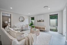  46A Railway Cres Lisarow NSW 2250 Combining fresh designer style with indulgently relaxed comfort, this luxe family home is the ultimate haven to retreat to. Set back from the street and privately positioned via a battle axe drive, a quality brick and tile exterior is immediately impressive, opening into sleek, light-filled interiors following a carefully considered floorplan. An immaculate single-level design offers generously proportioned private quarters along with a stunning gourmet kitchen and an open-plan main living zone occupying the heart of the home, all connecting out to an incredible al fresco entertaining space and rear yard. Features include: – Quality-built, freestanding brick and tile residence occupying a private position in a sought-after, ultra-convenient locale. – Light-filled interiors showcasing fresh contemporary style accentuated by a minimalistic aesthetic and high-quality fixtures and fittings throughout. – Lavish gourmet kitchen with gleaming Caesarstone countertops, an abundance of crisp white cabinetry, an integrated breakfast bar, designer lighting accents, and top-quality appliances. – Open-plan main living zone encompassing the kitchen, living, and dining, flowing out to a fully equipped and totally covered outdoor entertaining area. – Indulgent master suite with its own walk-in robe and designer ensuite. – Three additional bedrooms, all generously proportioned and offering built-in robes. – Large main bathroom complete with bath tub. – Ducted air conditioning throughout. – Double lock-up garage. – Landscaped grounds and gardens. – 643m2 parcel accessed via a private battle axe drive, ideally set back from the street. A superb lifestyle opportunity—conveniently located within close proximity to local shops, quality schools, and public transport options (bus and train) while being an easy drive to the University of Newcastle (Ourimbah Campus) and the M1 Motorway. The shopping meccas of Westfield Tuggerah and Erina Fair and a selection of beautiful beaches are all within a 20 minute (approx) drive. 