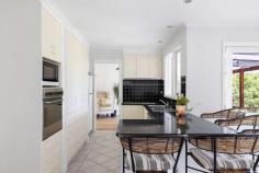  158 Kars Street Frankston South VIC 3199 $990,000 - $1,089,000 Inviting an element of play, this architectural home prioritises leafy aspects across an effortlessly welcoming environment. Zoned for both Overport Primary and Frankston High School, an array of living and dining spaces ensure flexibility deep within Frankston South. Perched high on the hill away from through-traffic, gentle birdsong accompanies a walk along Sweetwater Creek towards Oliver's Hill and the glistening waters of Port Phillip Bay. Met with a scarlet entryway, timber flooring sprawls throughout the living domain with a choice of three beautifully refreshed interiors including a privately accessed space ideal as a home office. Continuing a traditional design, the kitchen sits amongst an L-shaped family domain welcoming pops of greenery across stone bench-tops, gas stove, wall oven, and a breakfast bar welcoming conversation throughout the home. Enlarging the dining zone, an expanse of sheltered timber decking enjoys the afternoon sun elevated above the rear yard with space to watch the children and pets play. Extending in an east-west direction, three bedrooms include built-in robes, before a unity of textured tiles and timber accents sprawl across the master ensuite and shared bathroom. Split-system air conditioning and gas ducted heating offer climate control, with a single carport for off-street parking. Characterising the peaceful surrounds of Frankston South with a proximity to the heart of Frankston's every amenity, the sandy shoreline reveals a sprawl of recreational, retail and medical amenities within easy access for all. 