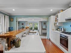  25 Coopers Rd Foster VIC 3960 $685,000 'Portsea'- Prepare to fall in love with this character filled cottage set on approx. 2944m2 of magnificent gardens right on the edge of town. Sighted to capture lovely views over the rural setting in this exclusive peaceful location, it is difficult to believe that the centre of town is only a 5 minute walk away. The sundrenched front verandah is just the spot for morning coffee and opens into the delightful entrance foyer. Period features such as polished flooring, high ceilings, fretwork and picture rails create the charm of a bygone era whilst the open interior caters for a modern lifestyle. Generous formal living / dining room with box bay window and wood heater. Central modern kitchen with island bench / servery to meals area (RC/AC) and doors out to a covered entertaining deck. Two large fitted bedrooms plus study/studio space , ideal for working from home. Huge central bathroom with statement claw foot bath, upsized shower recess and heritage style vanity. Expansive fitted laundry / utility room with second w.c. Rambling cottage gardens with a fringe of native trees attracting local birds and wildlife, even visiting koalas - see if you can spot one in the photos! There is a sheltered courtyard with veggie beds, and an open grassy area with extensive orchard, garden shed, carport and guest parking area. If you are looking for a country setting with walk to town convenience, this is a must see. 
