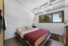  767 Trees Road Currumbin Valley QLD 4223 $1,995,000 10 Acre Natural Wonderland With Vast Coastline Views Dreaming of a tree change? Swap urban chaos for rural tranquillity and retreat to a 10 acre natural wonderland in Tallebudgera Valley. Hovering 300m above sea level and basking in spectacular views, a rolling tapestry of greenery sprawls out to meet the magnificent coastline, with the Pacific Ocean sparkling on the distant horizon. Co-existing in harmony with its surrounds is a charming mud brick home that speaks to the simplicity of life here among the treetops. Accessed by a newly sealed bitumen driveway, the exposed rock flooring, timber panelled walls and louvred windows reinforce the character of the unspoilt surrounds, while also keeping it naturally cool. Raked ceilings with timber beams and a feature mud brick wall enhance the earthy charisma in the lounge room, while the kitchen has been modernised with sleek white cabinetry and new appliances to complement the original stove. Two bedrooms and one bathroom grace the floorplan too, with the master bedroom offering enhanced peace and privacy via a private entry. A second bedroom features a built-in robe and handy direct access to a light-filled bathroom/laundry. There's ample room to relax on the outdoor deck that wraps around the side and the rear of the home, with flat grazing areas and a summer creek meandering through this lush bushland paradise as well. The 30kW solar system and a 50,000L water tank cater to an off-grid lifestyle, plus the home hosts a new and insulated 4-bay carport. There's even a cleared section overlooking Springbrook Mountain and Currumbin Valley, ready for you to build a second residence. Supremely peaceful and private, this idyllic oasis is conveniently just 11 minute's drive from Tallebudgera State School and shops/amenities (approx.), with beautiful beaches and coastal cafes of Palm Beach and Burleigh beckoning in 20 minutes (approx.). Experience the serenity, seclusion and enticing potential firsthand – arrange your inspection today. Main House Features 10 acre parcel of paradise with vast views stretching towards the coast Completely off-grid lifestyle on offer Charming mud brick and timber construction home Exposed rock flooring and louvre windows throughout Modernised kitchen with dual sink, 4 burner gas cooktop and oven, built-in pantry, original stove/oven and a 3-seater breakfast bar overlooking deck Lounge beneath 3.2m raked ceilings with exposed timber beams plus feature mud brick wall, wood fireplace, built-in cabinetry and sound system Master bedroom with louvre windows, storage room and private entry Bedroom 2 with built-in robe and access to light-filled bathroom/laundry Outdoor entertaining deck which wraps around half the home Other Features Cleared section for another building pad overlooking Springbrook Mountain and Currumbin Valley 30kW solar system with 60 panels Gas hot water New insulated four-bay carport Woodshed Shed with work bench and storage Flat grazing areas throughout the property Summer creek 50,000L water tank Located 300m above sea level Bitumen driveway, lined by a new concrete/rock retaining wall at the end section Location Approx. 11 mins to Tallebudgera State School and shops/amenities Approx. 15 mins to St. Andrew's Lutheran College Approx. 18 mins to The Pines, Elanora Approx. 19 mins to Palm Beach Approx. 20 mins to Burleigh Heads Approx. 20 mins to Currumbin Beach Approx. 26 mins to Gold Coast Airport Approx. 40 mins to Surfers Paradise 
