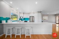 401 Old Coast Road Korora NSW 2450 $1,800,000 - $1,900,000 Introducing a magnificent family residence that offers breathtaking ocean, island, and hinterland views. This exceptional home provides an abundance of space, boasting over 450sqm of living area on an expansive just-under-1ha property. Whether you have a large family, seek an excellent setup for extended family living, or wish to explore Airbnb possibilities, the options are truly limitless. Upon entering the top storey, you'll be captivated by sweeping ocean views that embrace the grand living, dining, and kitchen area. Enhanced by elegant bamboo flooring and 9ft ceilings, this space creates a delightful atmosphere for entertaining. The sliding doors open onto the alfresco area, destined to become the heart of the home, where you can revel in the awe-inspiring ocean vista. This level also houses the luxurious main bedroom with an ensuite and an enormous walk-in wardrobe, along with two more generously-sized bedrooms, each featuring built-in wardrobes, and all served by the generously-proportioned main bathroom. Descending to the lower level reveals even more space and functionality. Discover a designated media room and an additional living area, thoughtfully designed with its own kitchenette. A fourth bedroom with its own ensuite adds to the convenience, while a purpose-built void offers the perfect opportunity for those considering a lift installation. With internal access from the triple car garage and ample under-house storage, this floor is ideal for teenage kids or extended family members. The home ensures utmost comfort with its ducted, zoned air conditioning, high ceilings, and a pleasing neutral color palette throughout, creating a harmonious living space. Perfectly situated within walking distance of Sapphire Beach, only 10 minutes drive from Coffs Harbour's CBD, shopping precincts, and beaches, this family home is sure to please. Don't miss out on this opportunity to secure a quality home that epitomizes substance and style, offering your family absolute enjoyment. 