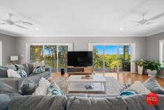  401 Old Coast Road Korora NSW 2450 $1,800,000 - $1,900,000 Introducing a magnificent family residence that offers breathtaking ocean, island, and hinterland views. This exceptional home provides an abundance of space, boasting over 450sqm of living area on an expansive just-under-1ha property. Whether you have a large family, seek an excellent setup for extended family living, or wish to explore Airbnb possibilities, the options are truly limitless. Upon entering the top storey, you'll be captivated by sweeping ocean views that embrace the grand living, dining, and kitchen area. Enhanced by elegant bamboo flooring and 9ft ceilings, this space creates a delightful atmosphere for entertaining. The sliding doors open onto the alfresco area, destined to become the heart of the home, where you can revel in the awe-inspiring ocean vista. This level also houses the luxurious main bedroom with an ensuite and an enormous walk-in wardrobe, along with two more generously-sized bedrooms, each featuring built-in wardrobes, and all served by the generously-proportioned main bathroom. Descending to the lower level reveals even more space and functionality. Discover a designated media room and an additional living area, thoughtfully designed with its own kitchenette. A fourth bedroom with its own ensuite adds to the convenience, while a purpose-built void offers the perfect opportunity for those considering a lift installation. With internal access from the triple car garage and ample under-house storage, this floor is ideal for teenage kids or extended family members. The home ensures utmost comfort with its ducted, zoned air conditioning, high ceilings, and a pleasing neutral color palette throughout, creating a harmonious living space. Perfectly situated within walking distance of Sapphire Beach, only 10 minutes drive from Coffs Harbour's CBD, shopping precincts, and beaches, this family home is sure to please. Don't miss out on this opportunity to secure a quality home that epitomizes substance and style, offering your family absolute enjoyment. 
